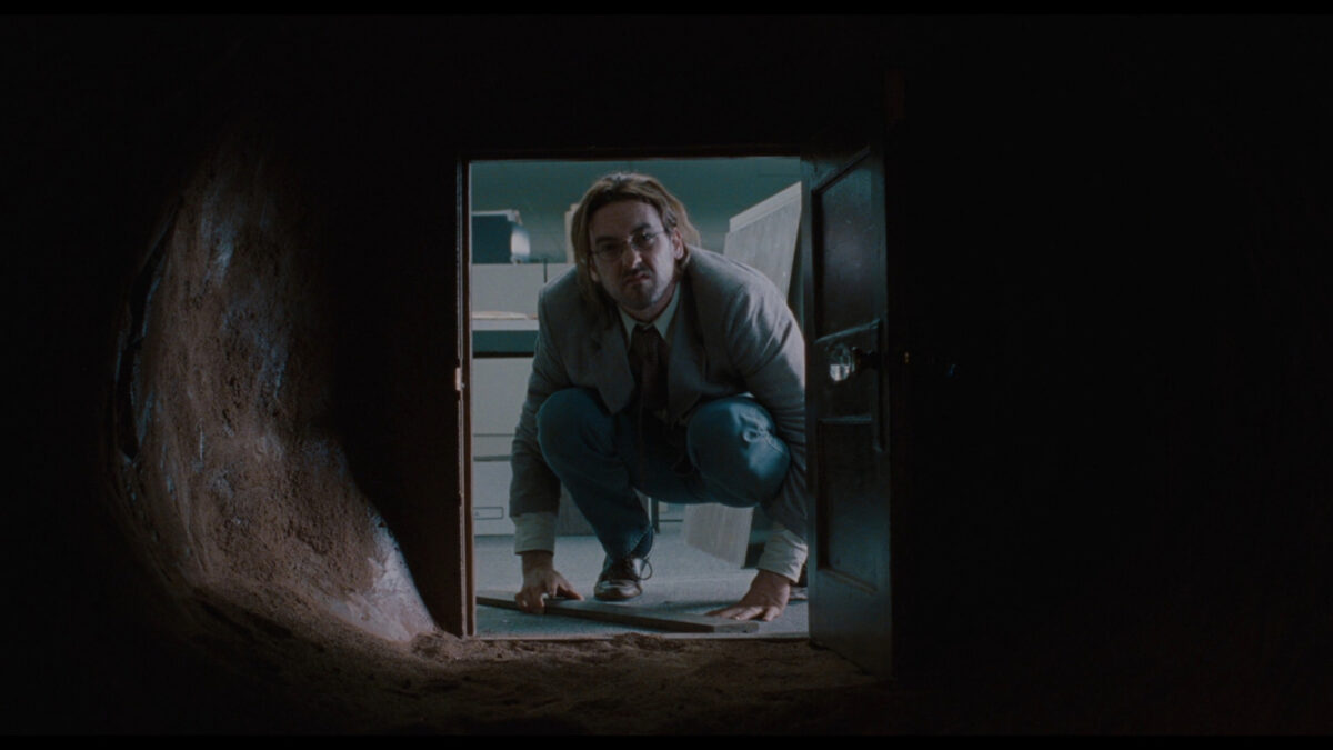 Craig looks down a tunnel that leads into John Malkovich's mind