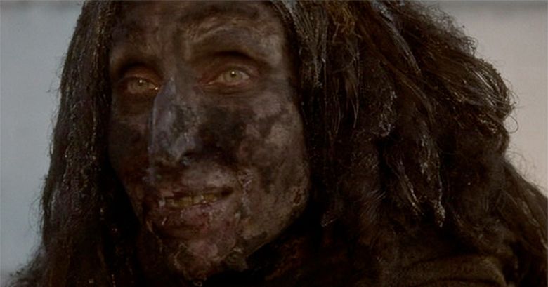 The ugly homeless woman smiles in Mulholland Drive