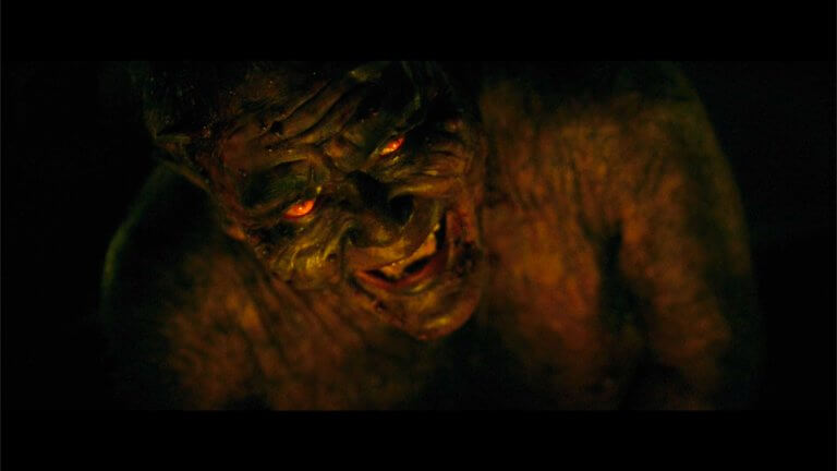 The Stranger transforms into the Devil at the end of The Wailling