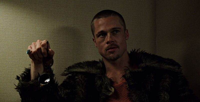 Tyler Durden (Brad Pitt) stares at Edward Norton in Fight Club