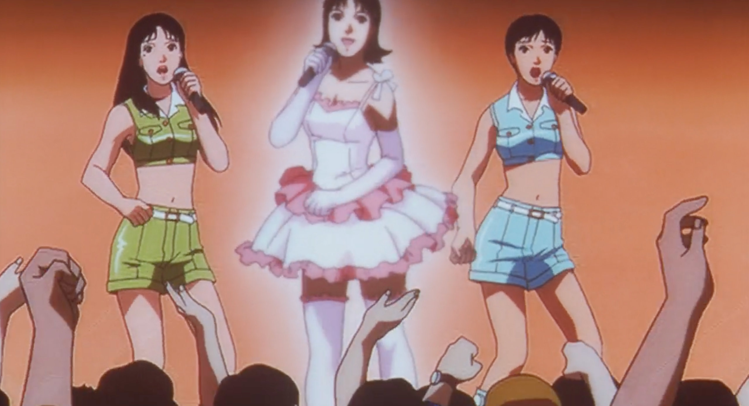 A glowing version of Mima performs with CHAM! at a concert in Perfect Blue