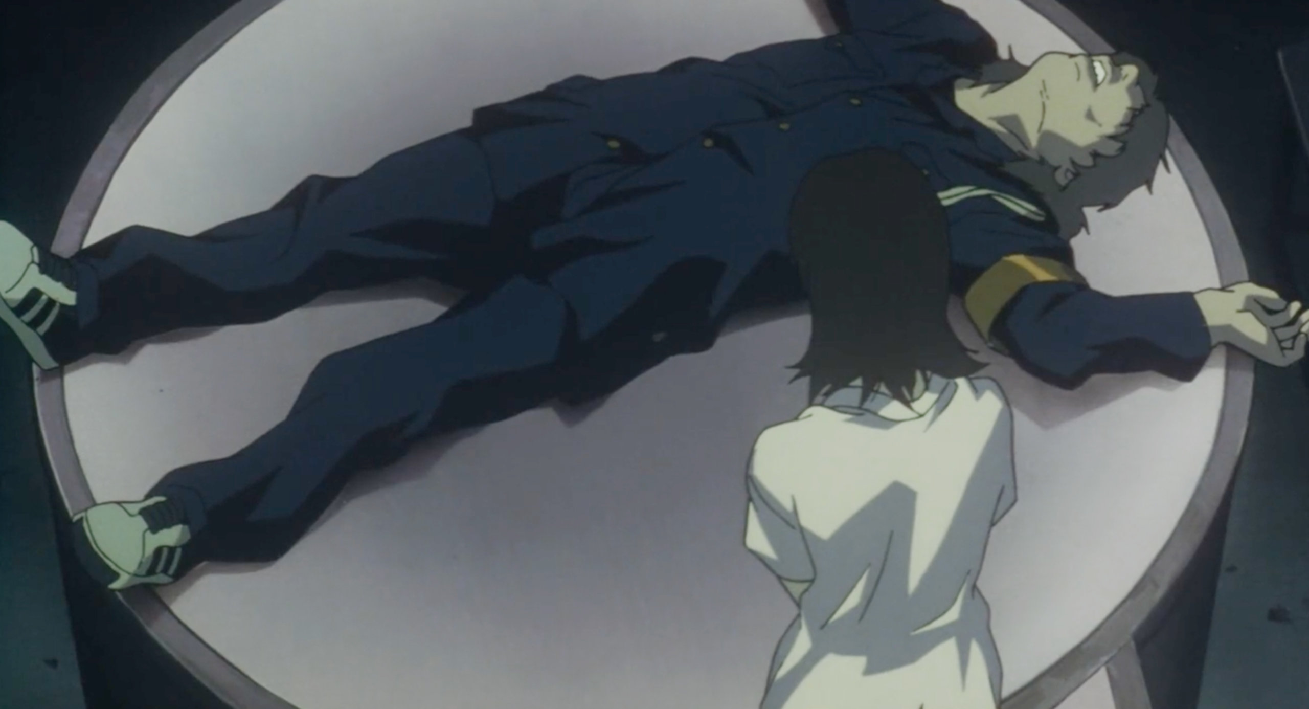 Mima stands over the body of Me-Mania after murdering him in in Perfect Blue