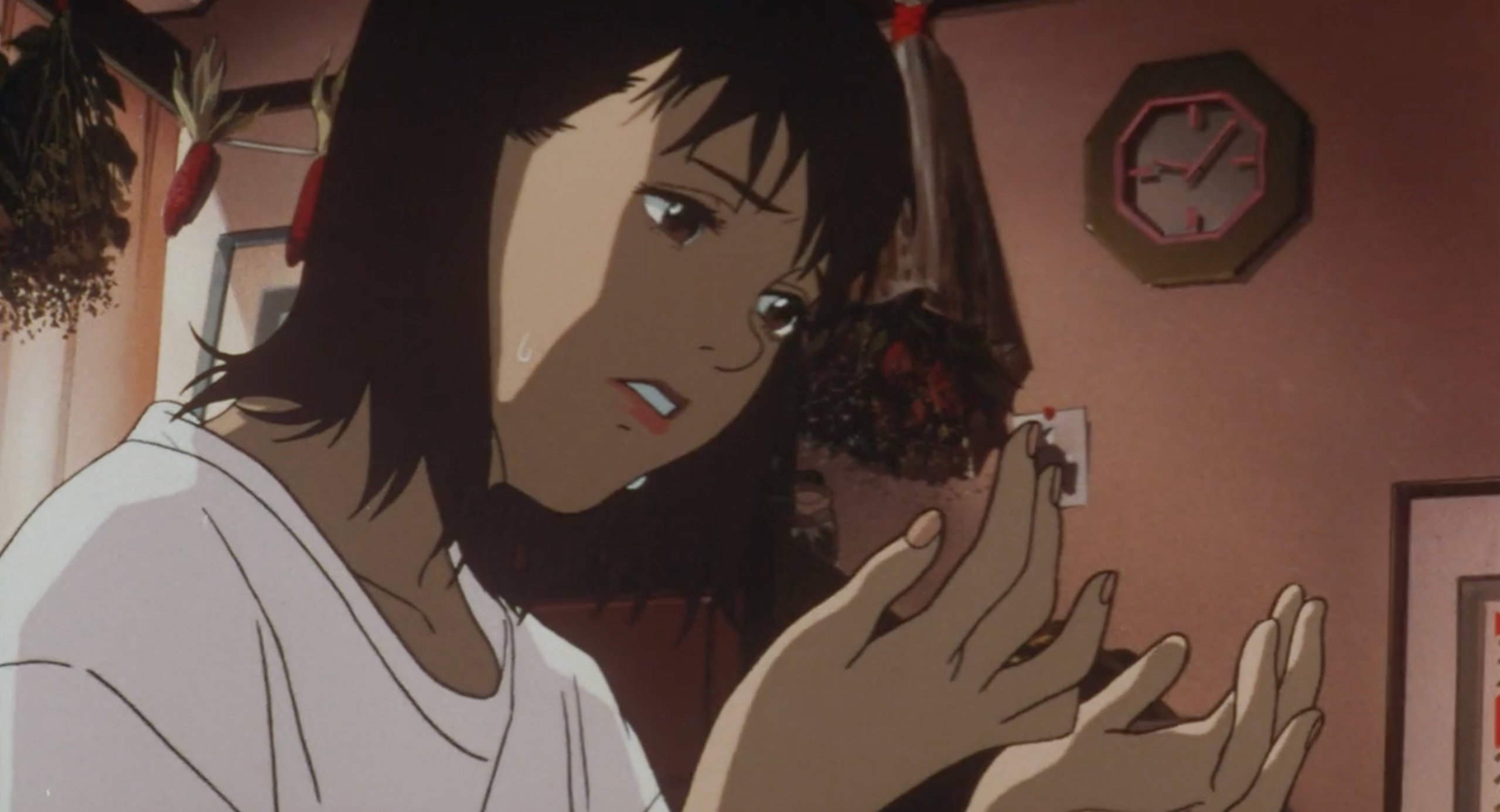 Mima stares at her hands in Perfect Blue