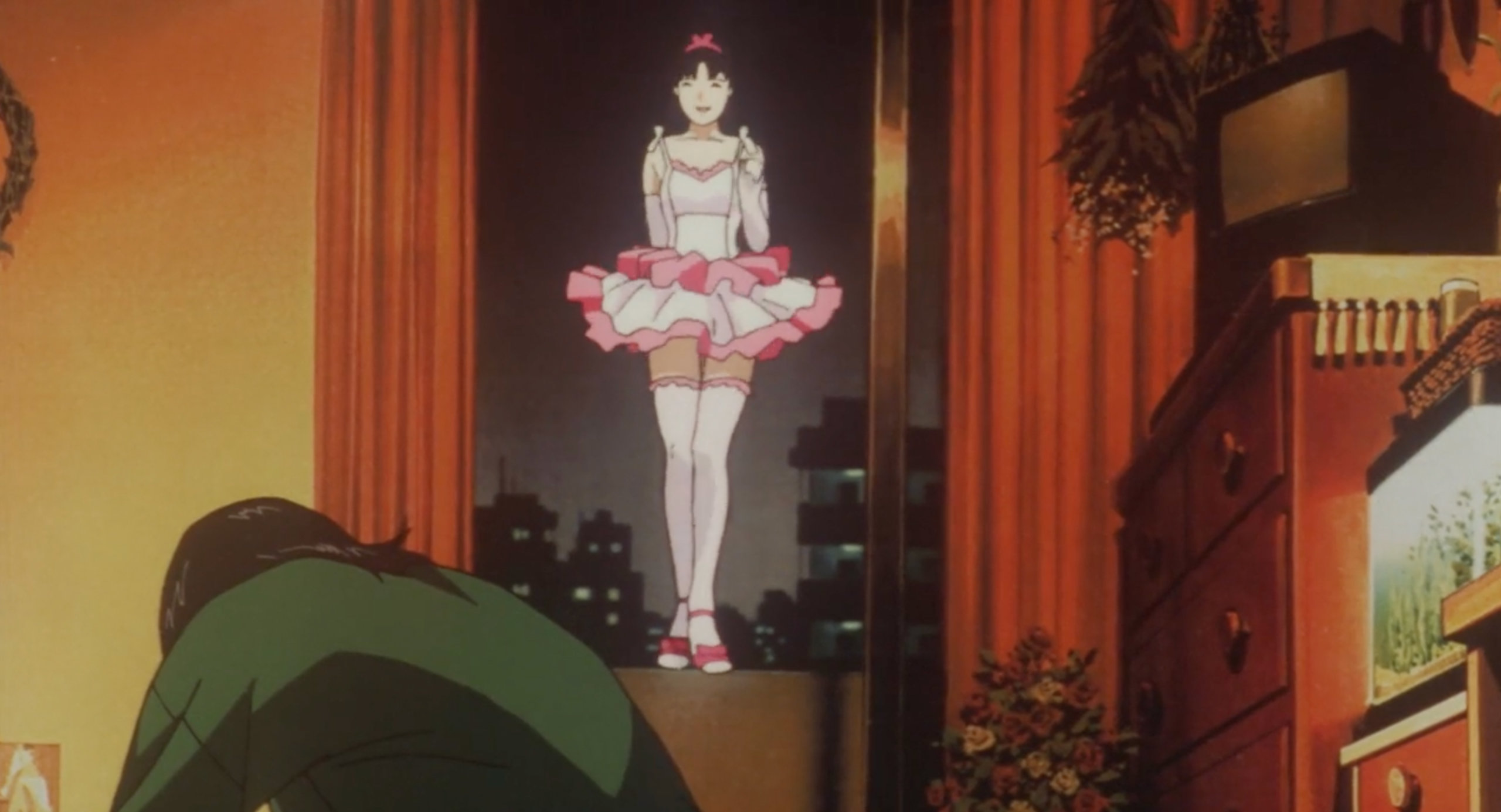 Idol Mima floats in the window of Mima's room in Perfect Blue