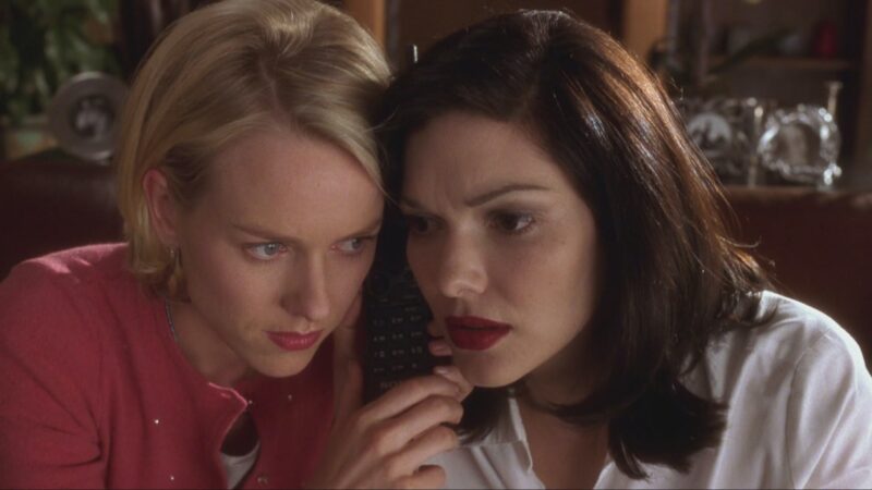 Diane and Rita listen in on a telephone call in Mulholland Drive