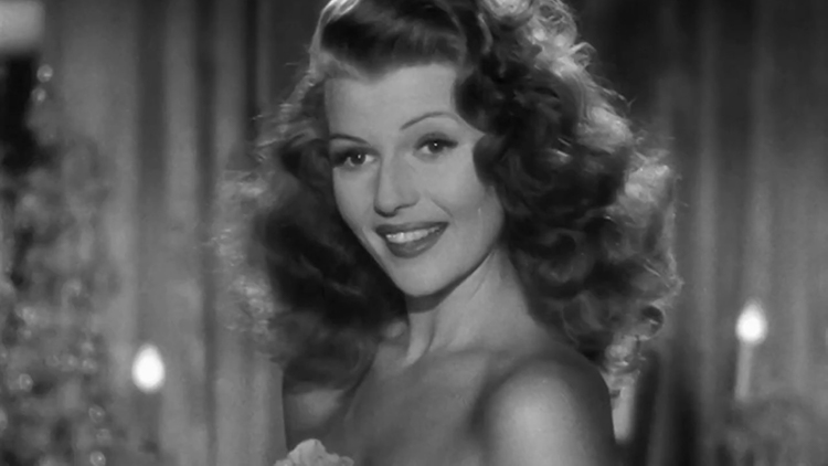 Rita Hayworth smiles in Gilda