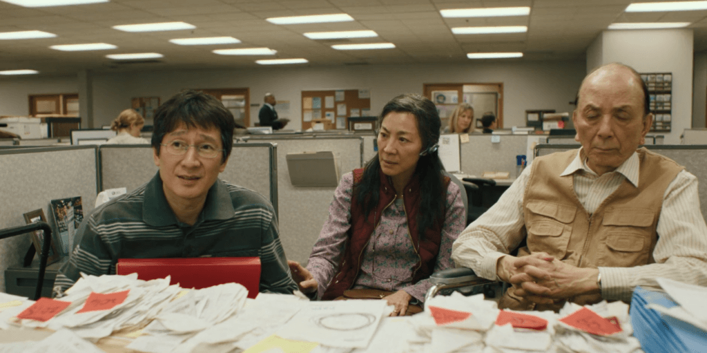 Waymond, Evelyn, and Gong Gong are stressed at the tax office. 