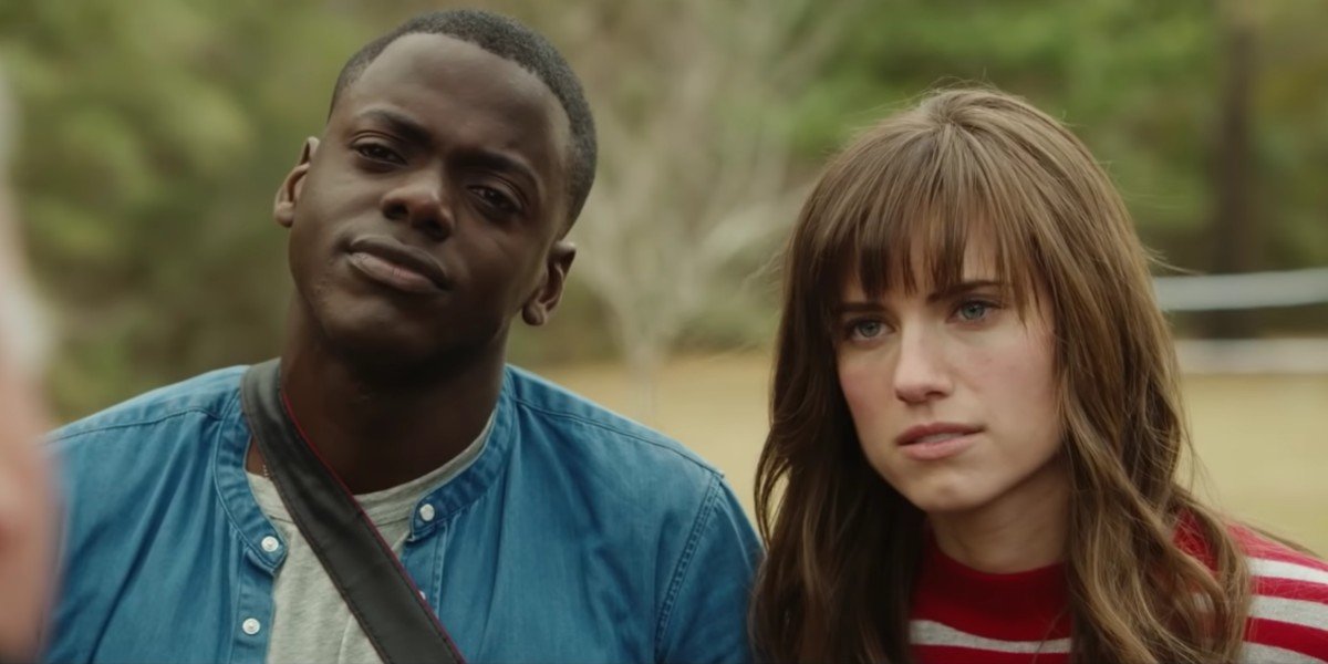 Chris (Daniel Kaluuya) and Rose (Allison Williams) talk to someone in the film Get Out