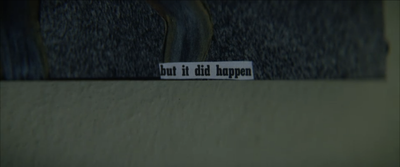A painting contains the words "but it did happen" 