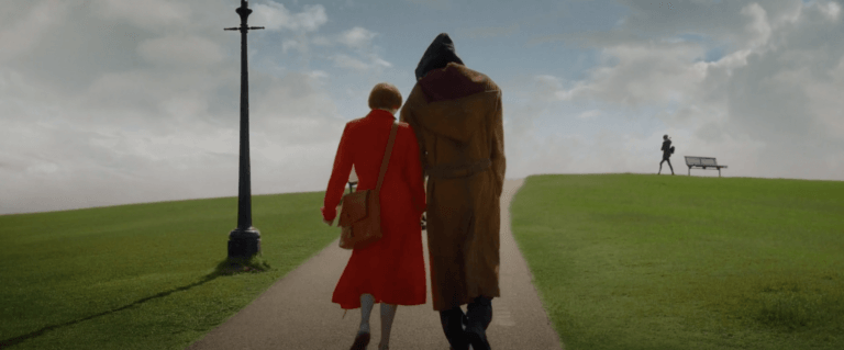 Alithea and Djinn walk down a road