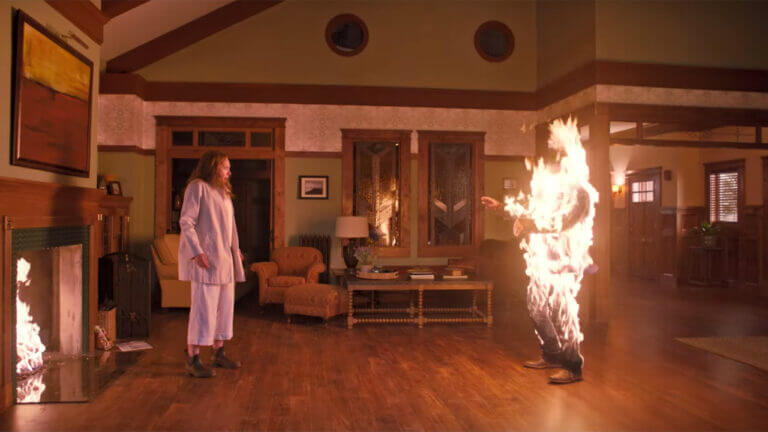 Annie Graham screams as her husband is consumed by flames in the middle of their living room