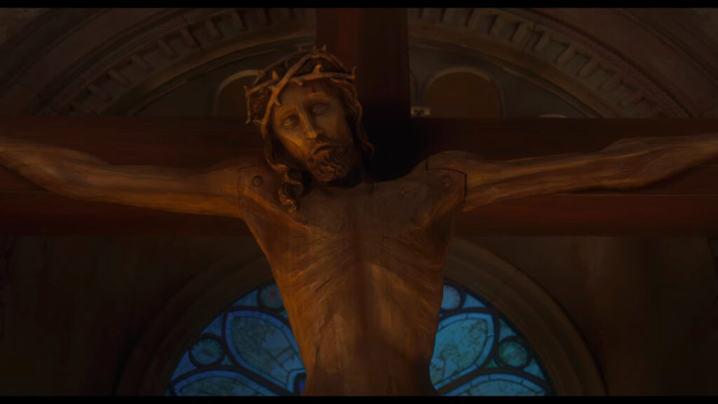A wooden carving of Jesus Christ on the cross