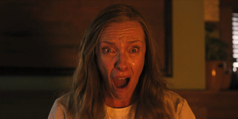 Annie Graham looks at something in terror in Hereditary