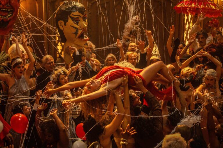 Nellie LaRoy at a lavish party, crowd surfing