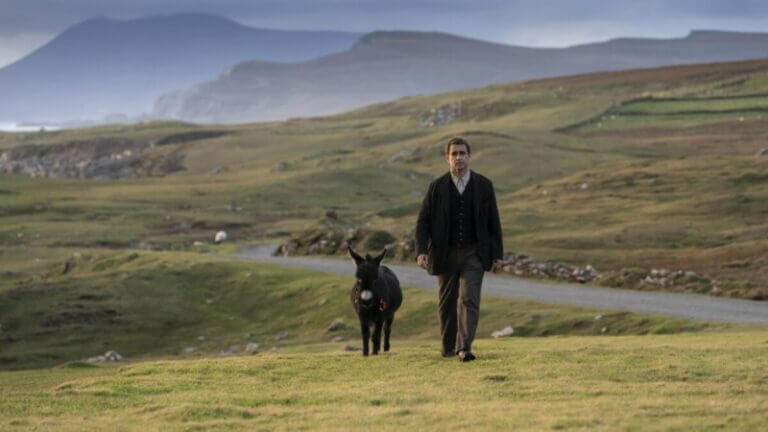 Pádraic walks with a donkey in the hills of Ireland