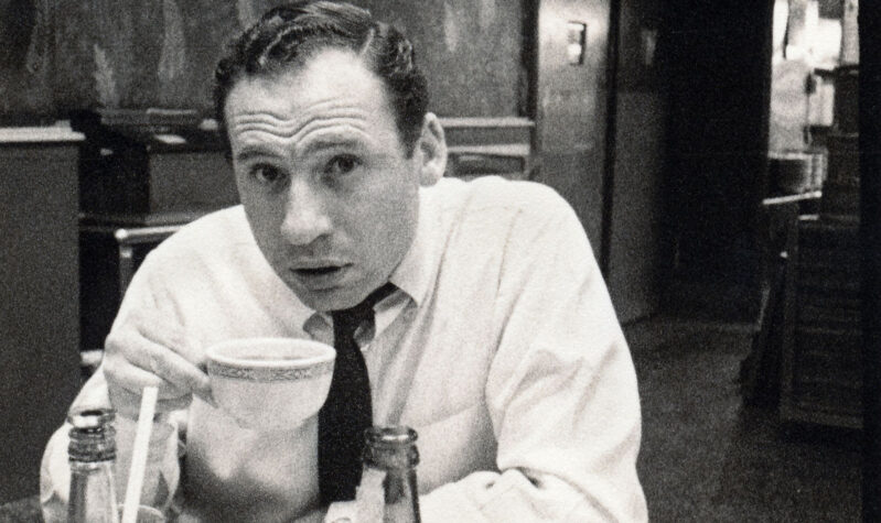 A man drinks coffee