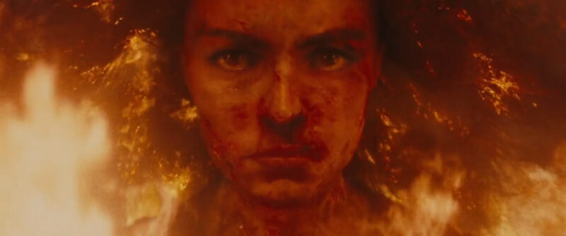 A woman's face in burning fire