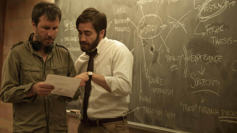 Denis Villeneuve and Jake Gyllenhaal converse on the set of Prisoners