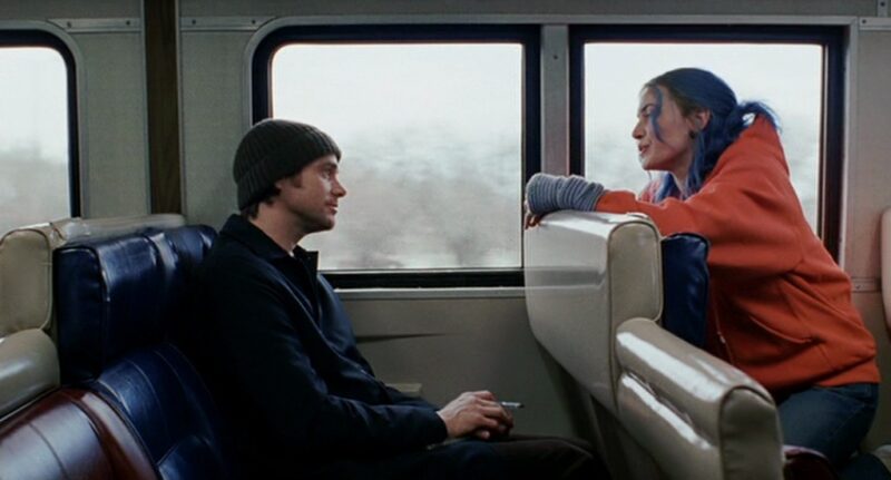 Joel and Clementine speak to each other on a train