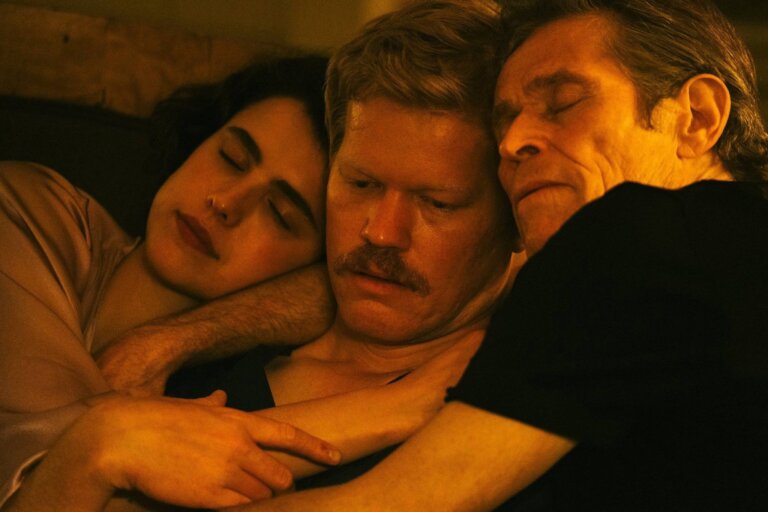 Vivian, Robert, and Raymond cuddle at the end of Kind of Kindness's first segment