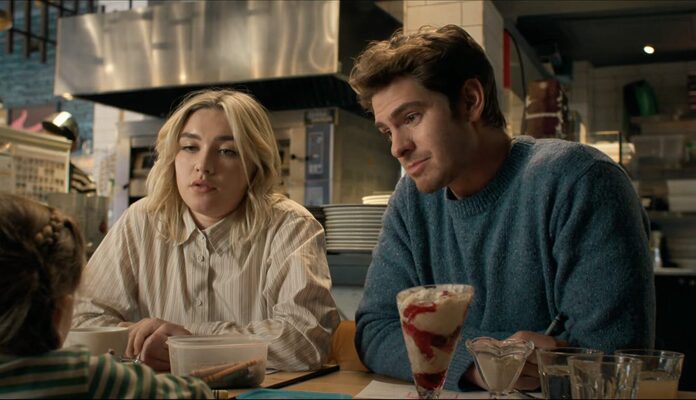 Almut and Tobias talk to Ella around an ice cream sundae