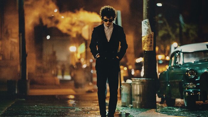 Bob Dylan walks down the street