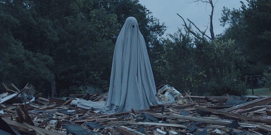 A ghost stands in the ruins of a bulldozed house