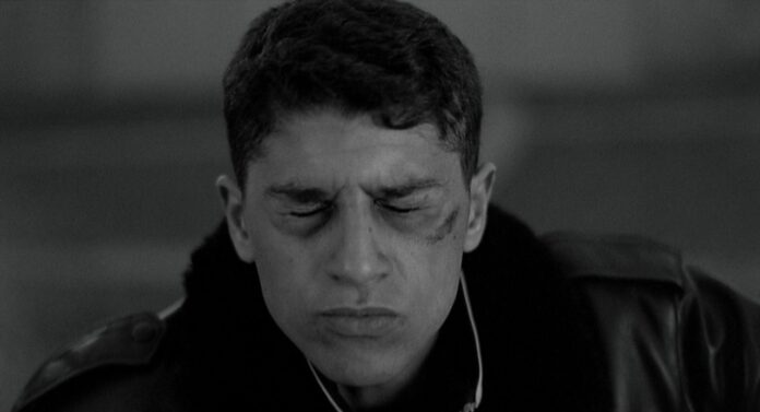 Saïd Taghmaoui closes his eyes at the end of La Haine