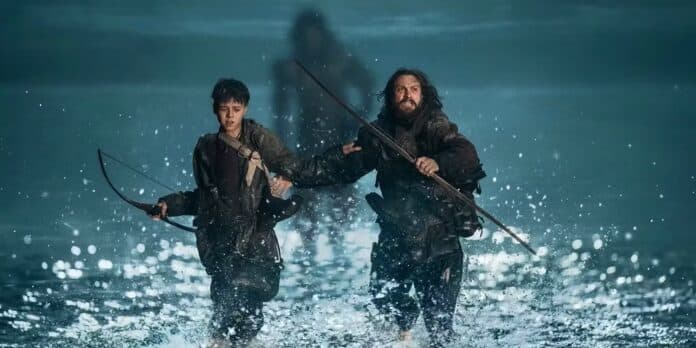 a father and son run from a monster